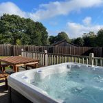 Hot tub and decking area at the Yaddlethorpe lodge