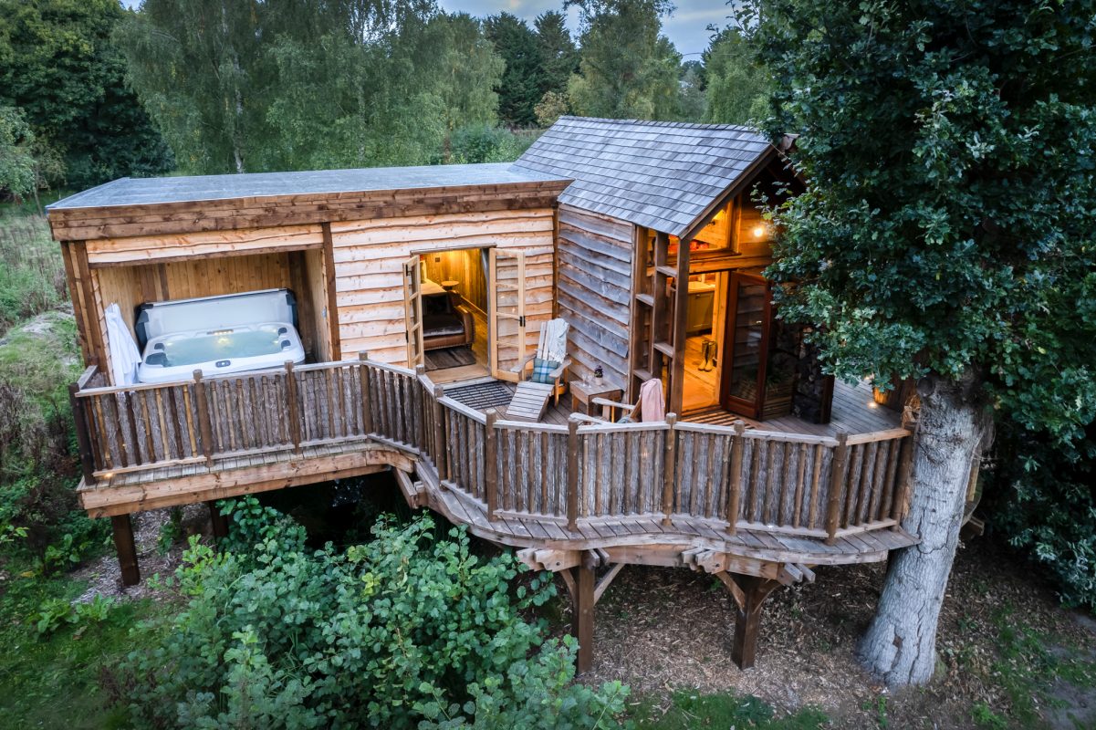 The Treehouse - a luxury romantic retreat for two with lakeside views and a hot tub