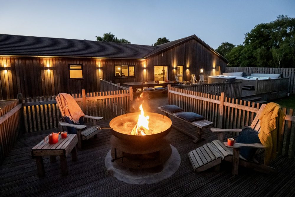 Outdoor at the Coach House with the fire pit lit, UK winter staycation, winter, winter getaway, Bainland Lodge Retreats