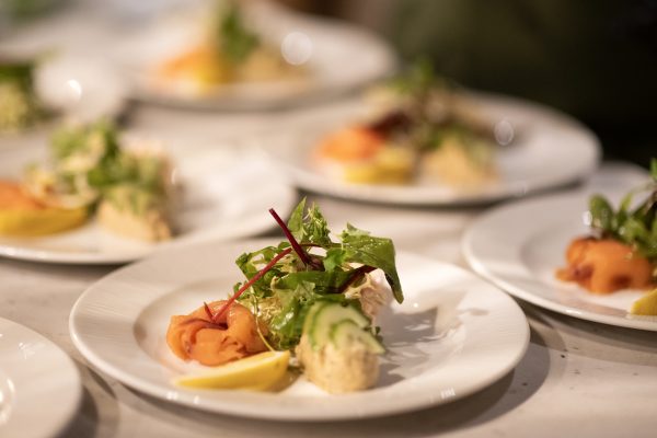 A dish prepared by our private chef with tuna, salmon, rocket and lemon